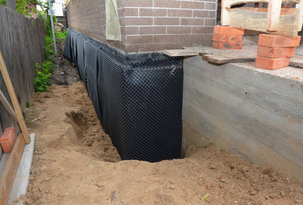 Happy homeowners after waterproofing job in New Johnsonville